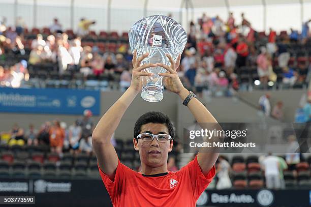 Hyeon Chung of South Korea holds aloft the ATP Most Improved Player trophy during day five of the 2016 Brisbane International at Pat Rafter Arena on...