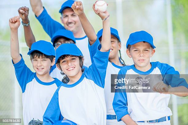 baseball team standing together - baseball team stock pictures, royalty-free photos & images