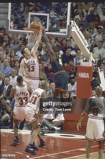 Finals Game 6. View of Seattle SuperSonics Shawn Kemp in action, dunking vs Chicago Bulls Luc Longley.