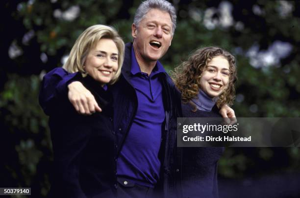 Pres. Bill & Hillary Rodham Clinton & daughter Chelsea leaving White House in close-knit, happy family portrait.