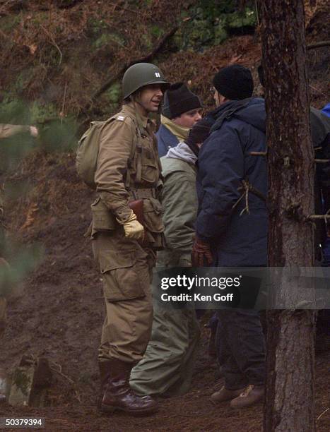 Actor David Schwimmer during making of HBO TV mini-series Band of Brothers, based on WWII historian Stephen Ambrose's nonfiction book on army rifle...