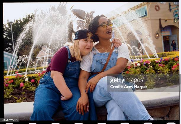Sunny Taliaferro with 18-yr-old friend Melissa Milne, who is HIV+ and a senior at California's Las Lomas High School. Milne contracted the disease...