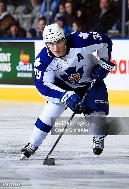 Matt Frattin of the Toronto Marlies carries the puck up ice against the Syracuse Crunch during AHL game action on January 3, 2016 at Ricoh Coliseum...