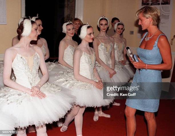 England's Princess Diana in short light blue dress w. Ballerinas arriving at the Royal Albert Hall for a performance of Swan Lake by the English...