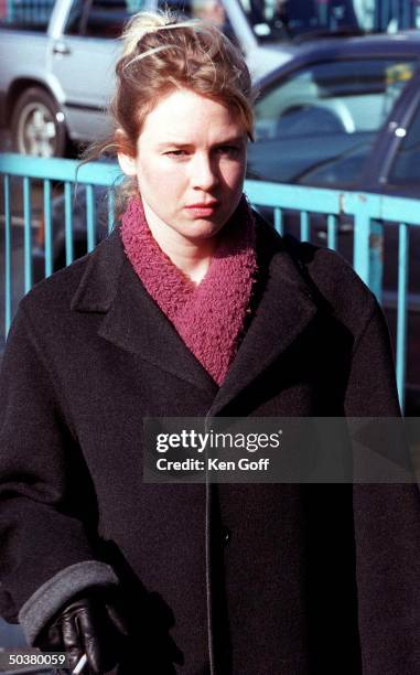 Actress Renee Zellweger pouting on the set of the film Bridget Jones's Diary at Tower Bridge.