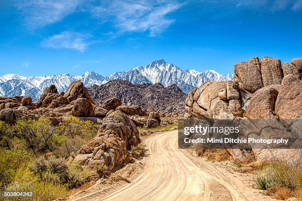 road in the alabama hills - alabama hills stock pictures, royalty-free photos & images