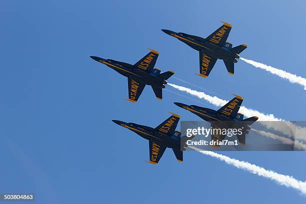 four blue angels in flight - blue angels stock pictures, royalty-free photos & images