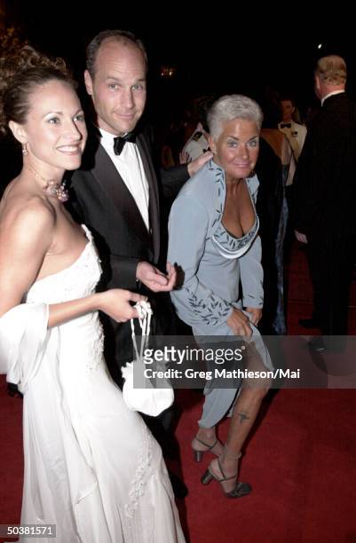 Survivor 2 television series contestants Jerri Manthey, Michael Skupin and Maralyn Mad Dog Hershey arriving at party following the annual White House...