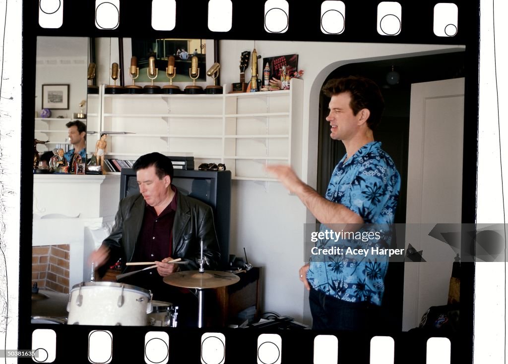 Singer Chris Isaak with drummer Kenney Dale Johnson practicing their ...