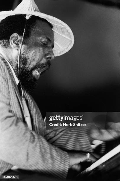 Jazz musician Thelonious Monk playing piano.