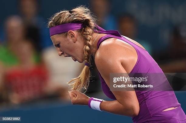 Victoria Azarenka of Belarus celebrates in her match against Roberta Vinci of Italy during day five of the 2016 Brisbane International at Pat Rafter...