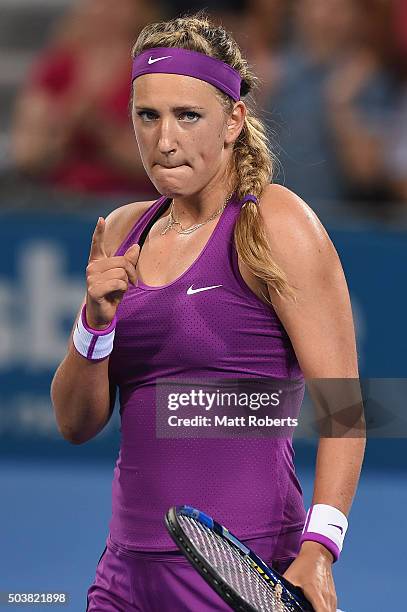 Victoria Azarenka of Belarus celebrates winning her match against Roberta Vinci of Italy during day five of the 2016 Brisbane International at Pat...