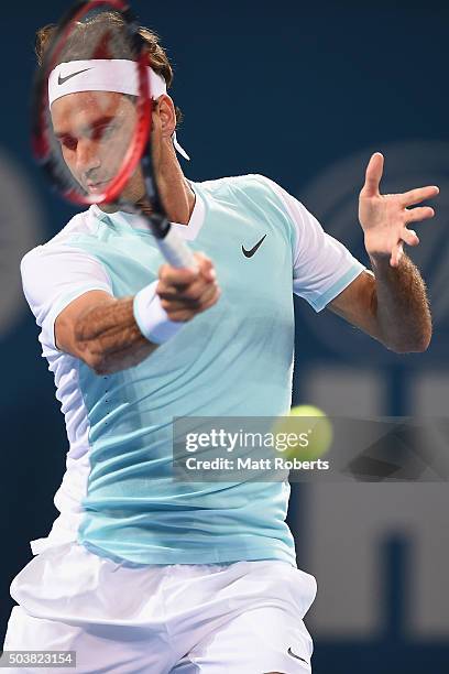 Roger Federer of Switzerland plays a forehand against Tobias Kamke of Germany during day five of the 2016 Brisbane International at Pat Rafter Arena...