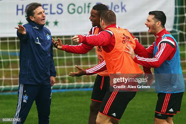 Head coach Bruno Labbadia discusses with Cleber, Pierre-Michel Lasogga and Emir Spahic during a Hamburger SV training session on day 2 of the...