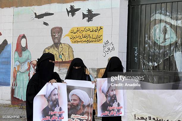 Supporters of Houthi movement stage a protest against the execution of prominent Saudi Shia cleric Nimr Baqir al-Nimr by Saudi authorities, in Sanaa,...