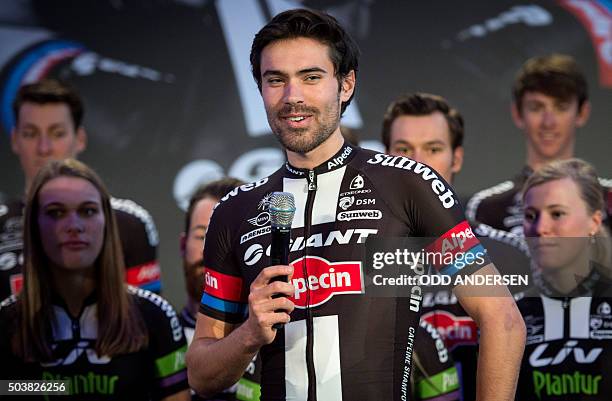 Dutch rider Tom Dumoulin stands on stage during the launch of the 2016 Giant-Alpecin cycling team at the Italian embassy in Berlin on January 7,...