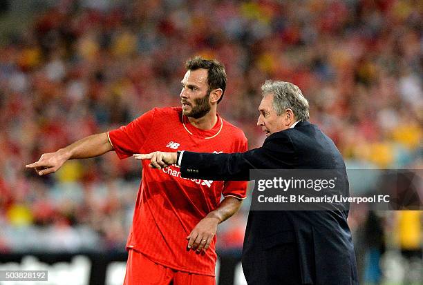 Patrik Berger of the Liverpool Legends and Team Manager Gerard Houllier talk tactics during the match between Liverpool FC Legends and the Australian...