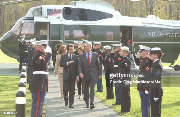 Spanish Prime Minister Jose Maria Aznar and Pres. George W. Bush w. : Aznar's wife Ana Botella and First Lady Laura Bush arriving at Camp David.