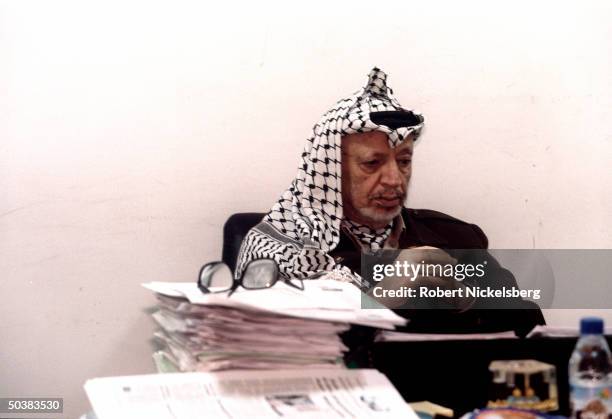 Palestinian leader Yasser Arafat in his office.