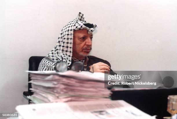 Palestinian leader Yasser Arafat in his office.