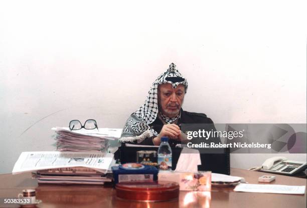 Palestinian leader Yasser Arafat in his office.