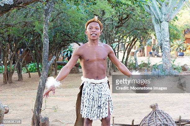 zulu man in kwazulu-natal, south africa - men in loincloths stock pictures, royalty-free photos & images
