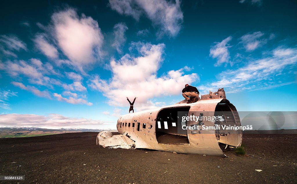 Handstand on a plane wreckage