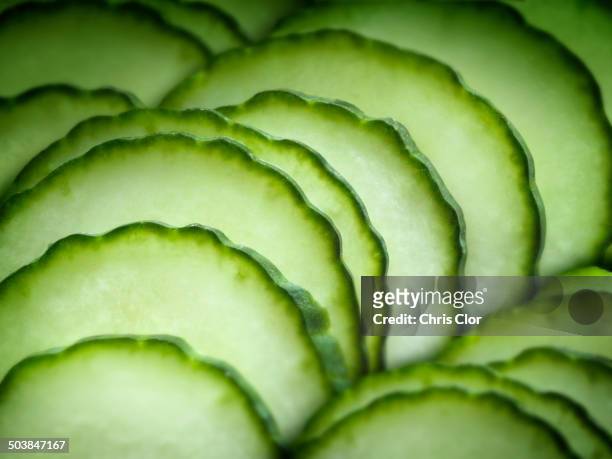 close up of sliced fruit - gurke stock-fotos und bilder