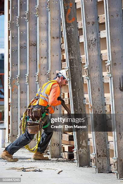 Pushing Over Building 751 Man Pushing Against Wall Stock Photos, High-Res Pictures, and ...