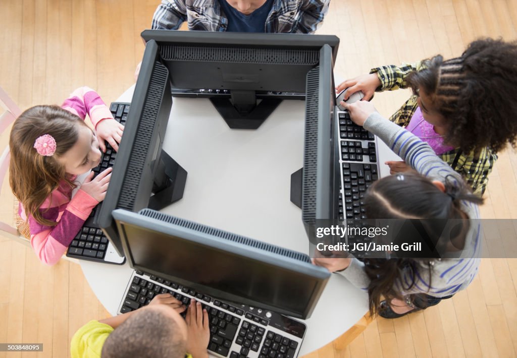 Children using computers in classroom