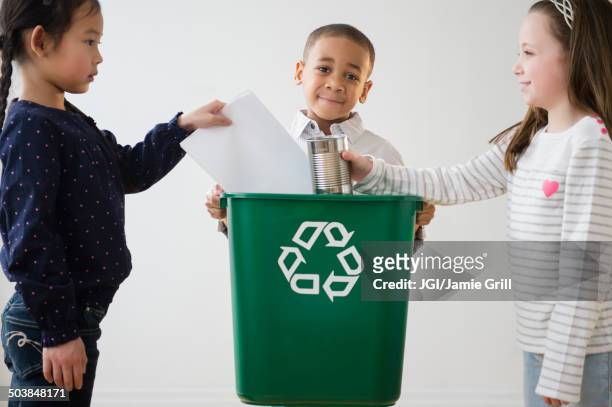 children recycling together - we can do it stock pictures, royalty-free photos & images