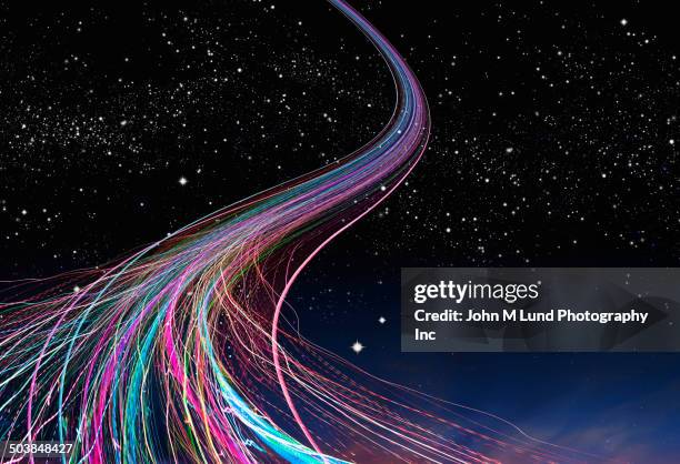 light trails in starry sky - 情報スーパーハイウェイ ストックフォトと画像