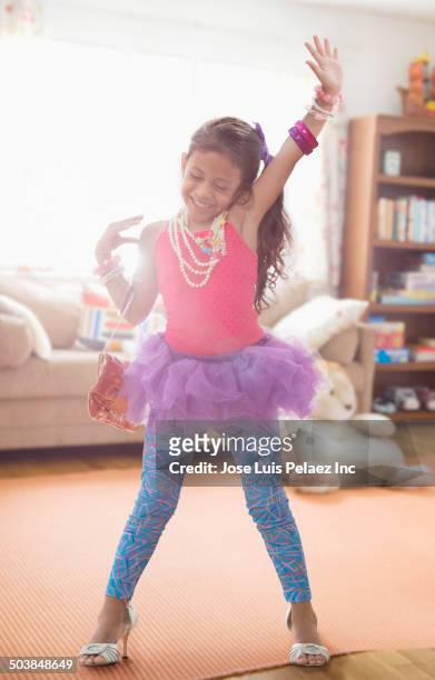 girl playing dress up in living room - child high heels stock pictures, royalty-free photos & images