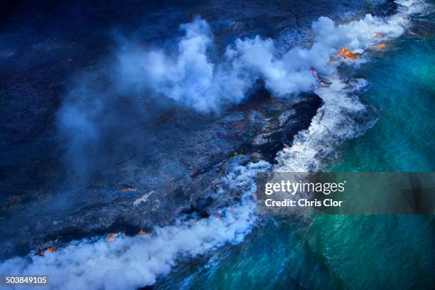 aerial view of undersea volcanoes erupting - lava ocean stock pictures, royalty-free photos & images