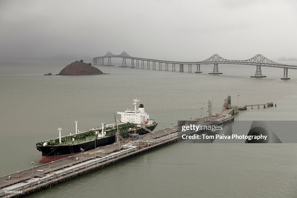 Oil tanker offloading in urban dock