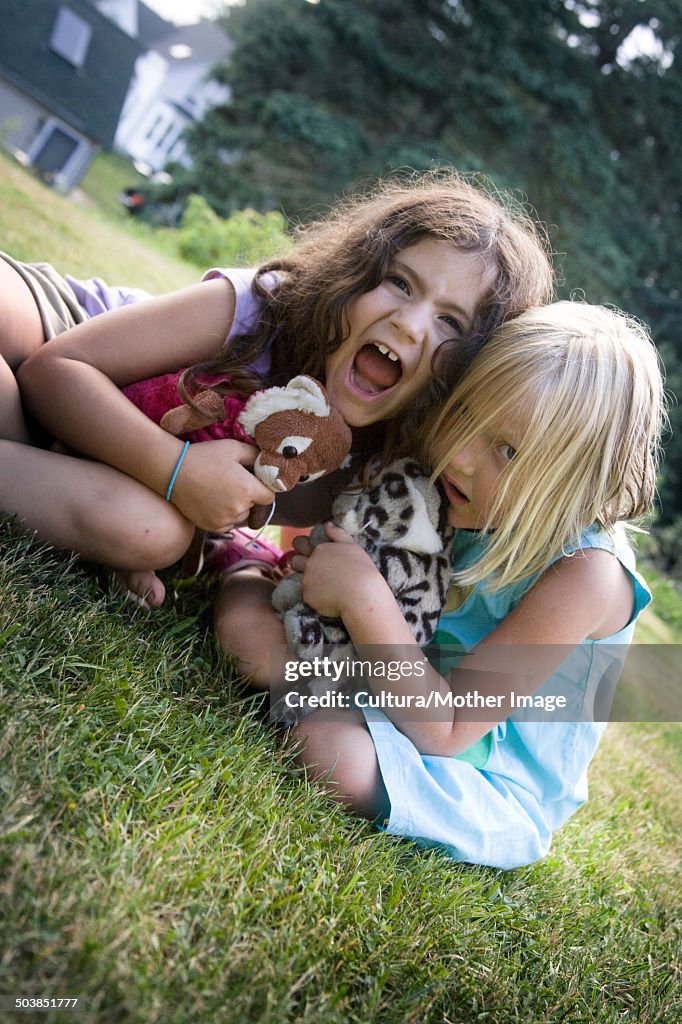 Girls playing in backyard