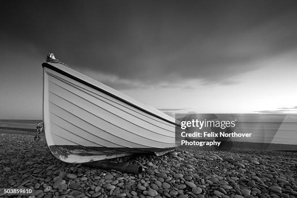 lonely boat - budleigh stock pictures, royalty-free photos & images