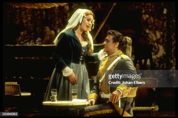 Soprano Angela Gheorghiu as Micaela singing w. Tenor Placido Domingo as Don Jose in Bizet's Carmen on stage at the Metropolitan Opera.