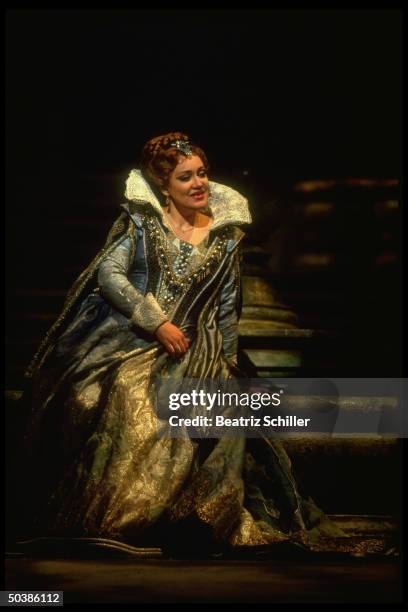 Russian mezzo soprano Olga Borodina singing the role of Princess Marina in Mussorgsky's Boris Godunov on stage at the Metropolitan Opera.