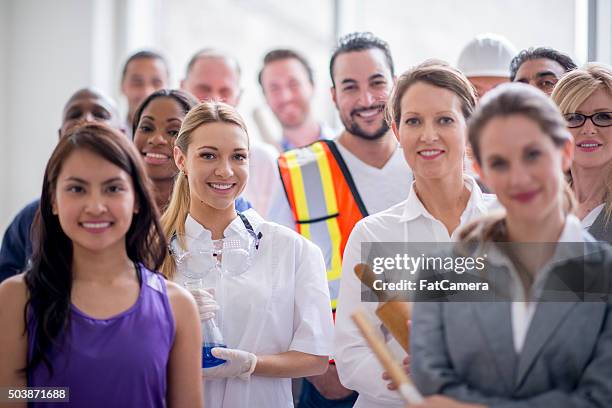 happy group of professional workers - middelgrote groep mensen stockfoto's en -beelden