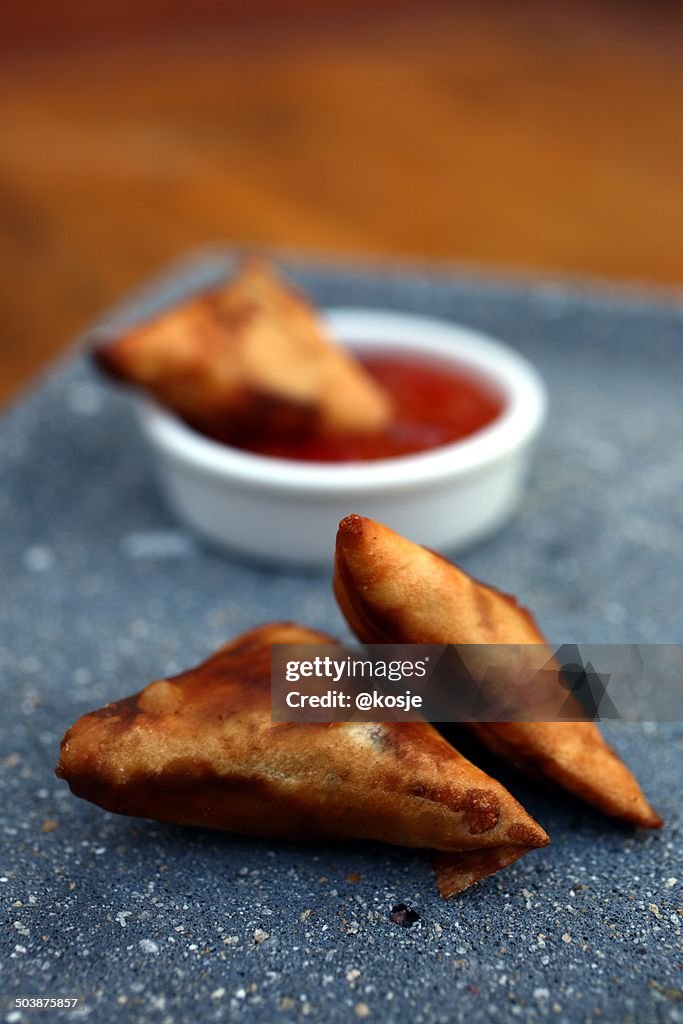 Samosas with spicy dip