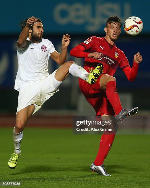 Sakib Aytac of Antalyaspor is challenged by Borys Tashchy of Stuttgart during a friendly match between VfB Stuttgart and Antalyaspor at Akdeniz...