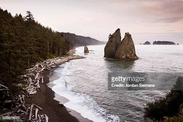 sunset over rialto beach. - rialto beach stock pictures, royalty-free photos & images