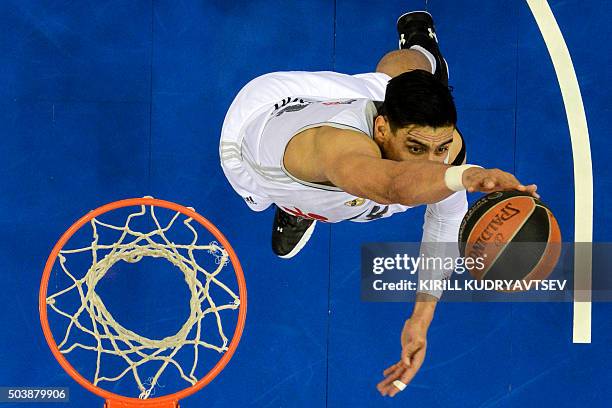 Real Madrid's Mexican center Gustavo Ayon jumps to the basket with the ball during the Euroleague Top 16 group F basketball match between CSKA Moscow...