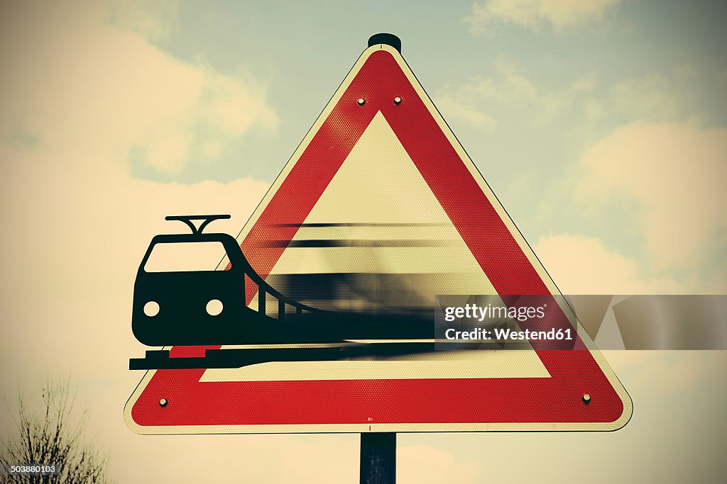 Moving train leaving sign, composite