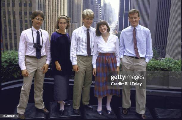 Group of five TIME student summer interns posing together on balcony of building, including Peter Cleveland, Wendy Smith, Jay Carney, Amanda Jo...