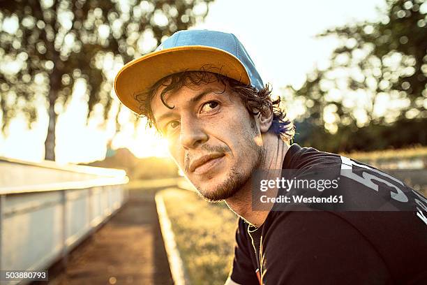 germany, hannover, portrait of biker, looking away - hanover germany bildbanksfoton och bilder