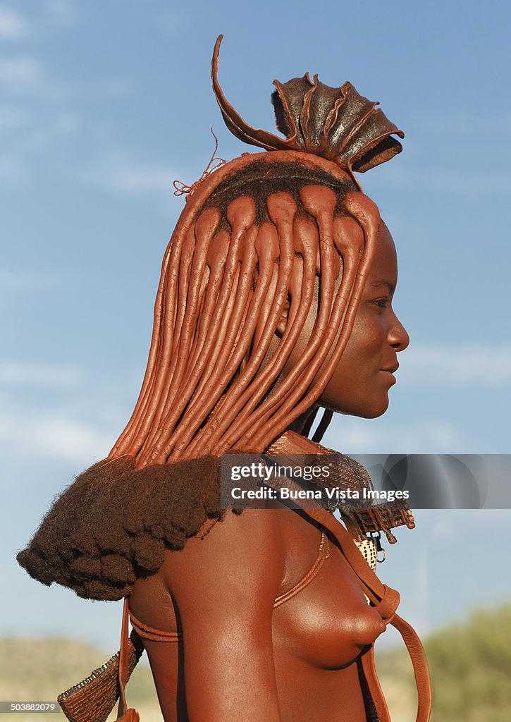 Himba woman with traditional hair dress