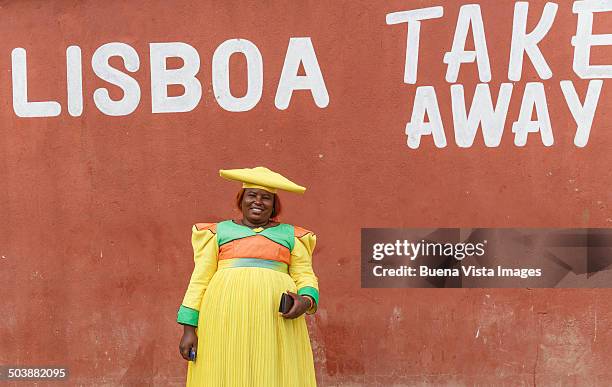 herero woman with traditional dress - opuwo stock pictures, royalty-free photos & images