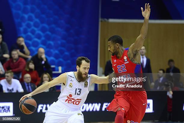 Cory Higgins of CSKA Moscow vies with Sergio Rodríguez of Real Madrid during the Turkish Airlines Euroleague Top 16 match between CSKA Moscow and...